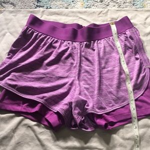 Champion Powertrain running shorts size medium. Black and pink pair